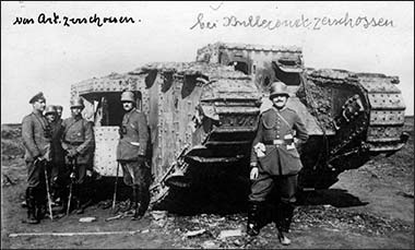 German officers and soldiers next to a destroyed British Mark IV tank at Bullecourt, 1917 – with permission from the German Bundesarchiv - Bild 146-1984-059-06A - Photographer o. Ang