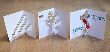 Three rough cut-and-fold greeting cards