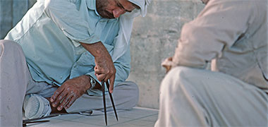 A craftsman preparing a design, 1983