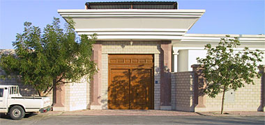 Entrance to a property with solid gate