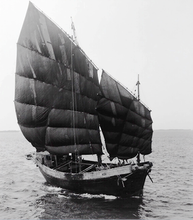 Chinese junk with fully battened lug sails set, taken by my father in the South China Sea in the 1950s