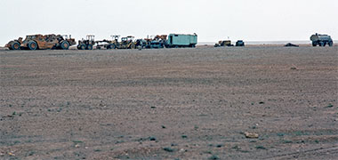 Contractor’s equipment parked in the desert, 1972
