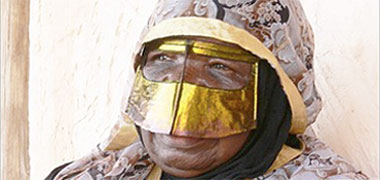 A Qatari woman wearing a batula 