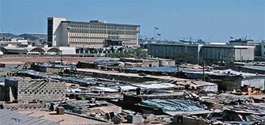 The Shari’a Courts, Government House and the vegetable suq photographed from the south-west in 1974
