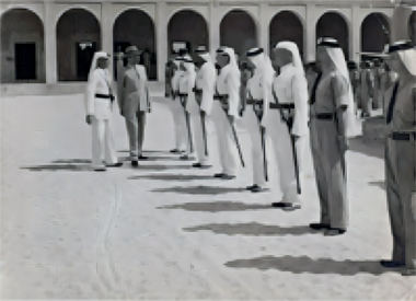 Group Captain Phillip L. Plant and Commandant Ronald Cochrane inspecting a guard at the Police Headquarters, June 1954 - courtesy of Qatar National Library Digital Archives