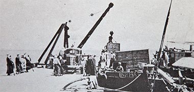 Moving goods ashore at Zikrit in 1948