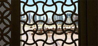 A view through a grille towards the New District of Doha – with permission from Grant Macdonald