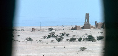 View of one of the towers from the fortified structure at Umm Salal Muhammad, March 1975