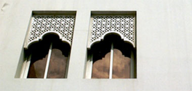 Mushrabiyah partially protecting a window 