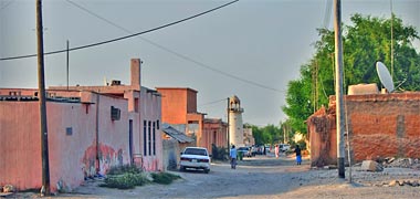 A street scene with mosque in Wakra